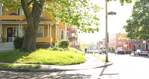 Image of outside of a home and street